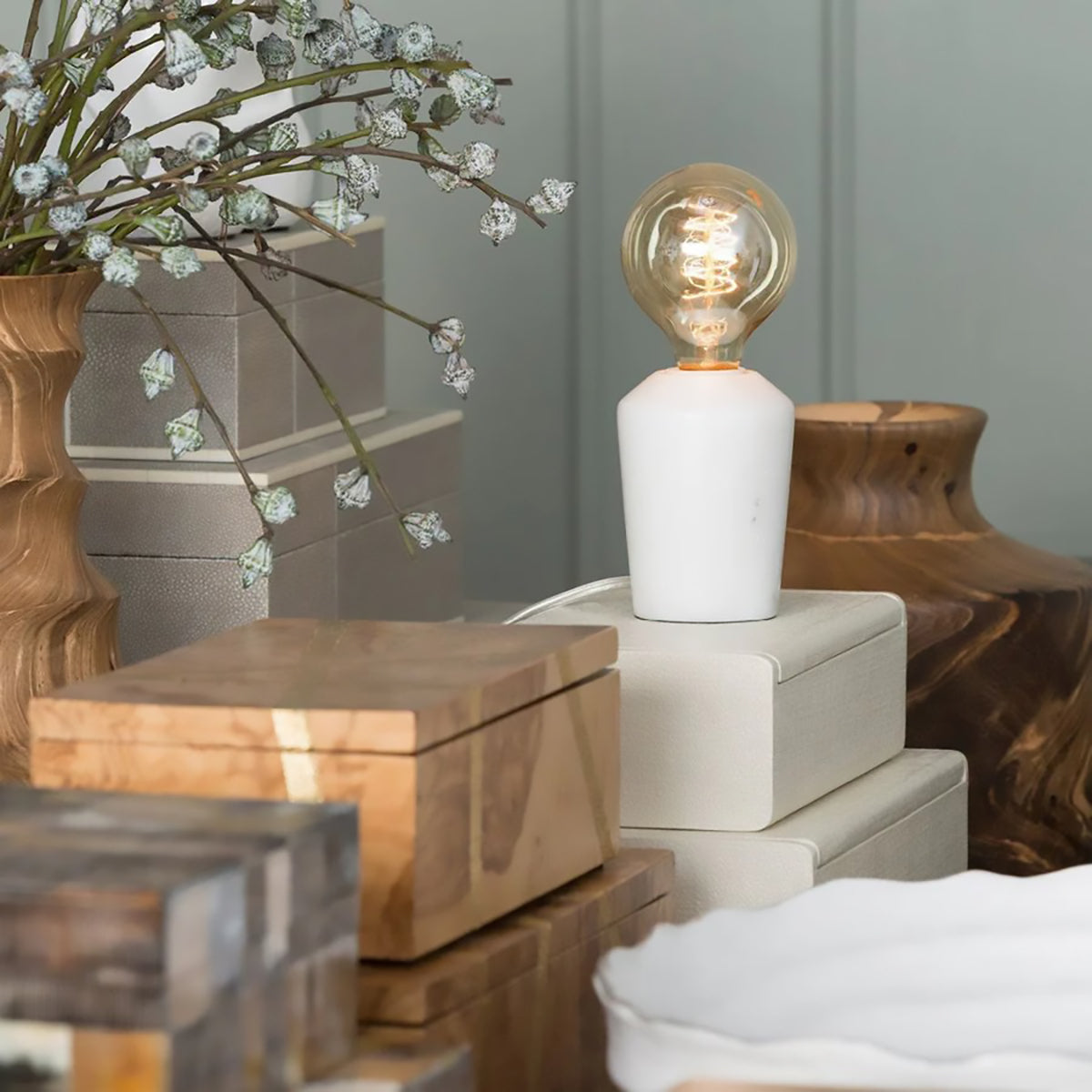 An image of Made Goods Grazia Bookcase Light - Crystal White Marble - Set of 2 with Bulb