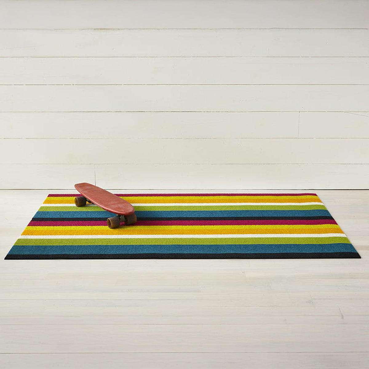 An image of Chilewich Bold Stripe Shag Floor Mat 24x36