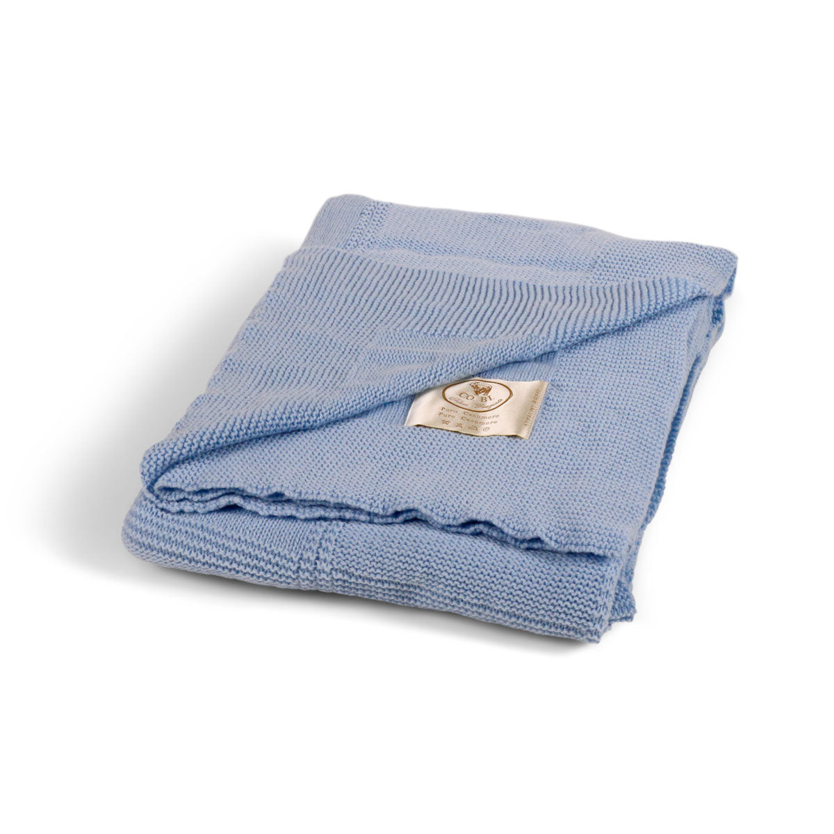 An image of Cobi Cashmere Nuvola Knitted Throw window pane design