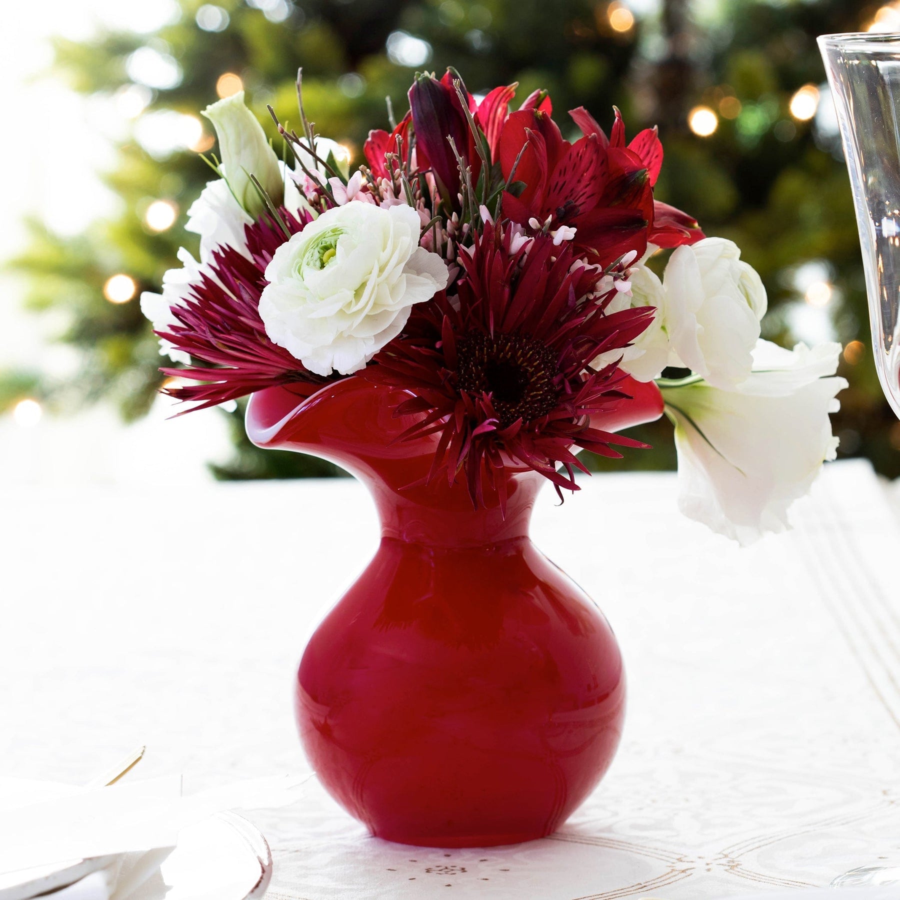 An image of Vietri Hibiscus Glass Bud Vase